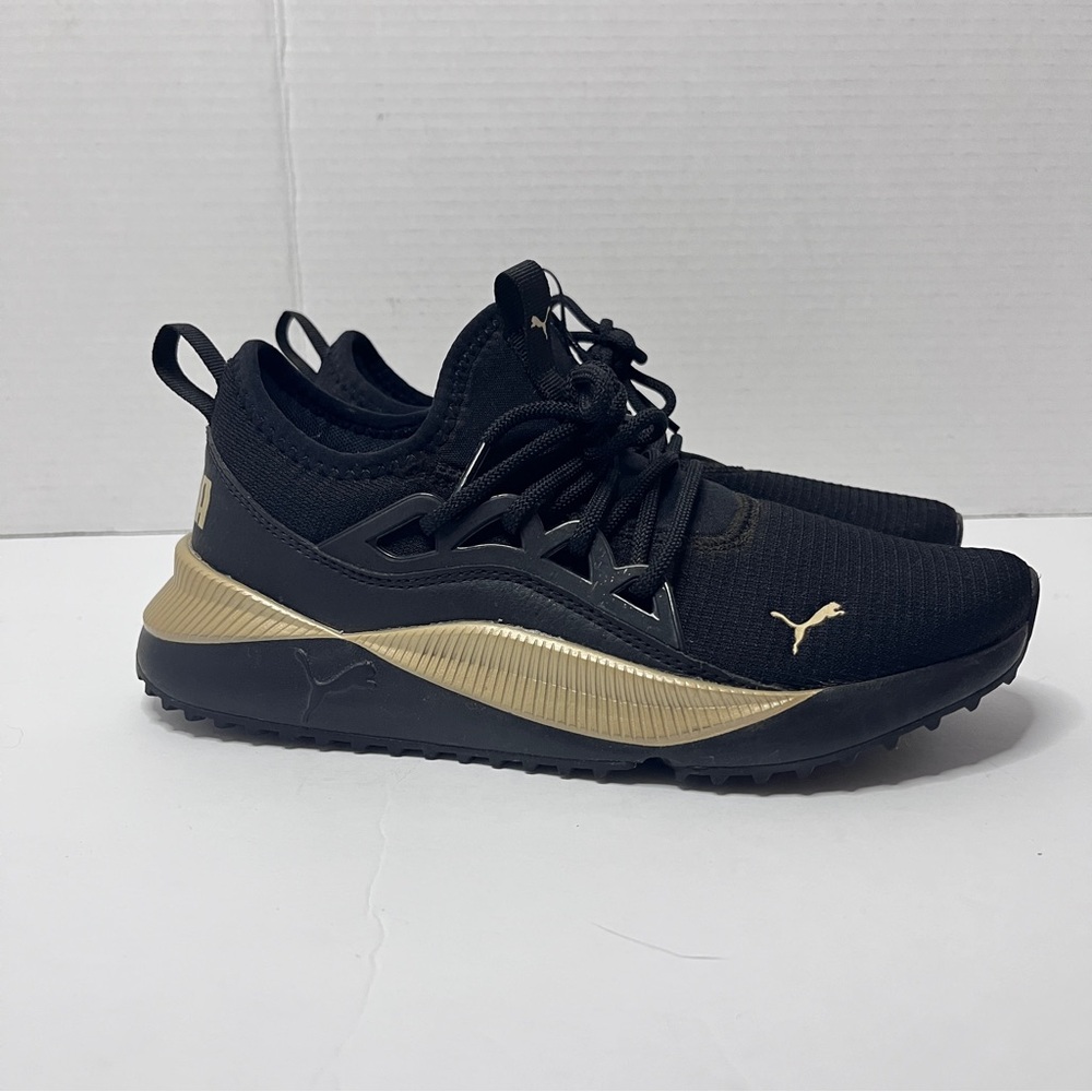 Puma Black Sneakers with Gold Highlights